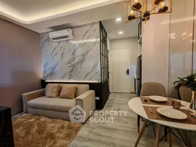 Modern living room with stylish decor and air conditioning unit