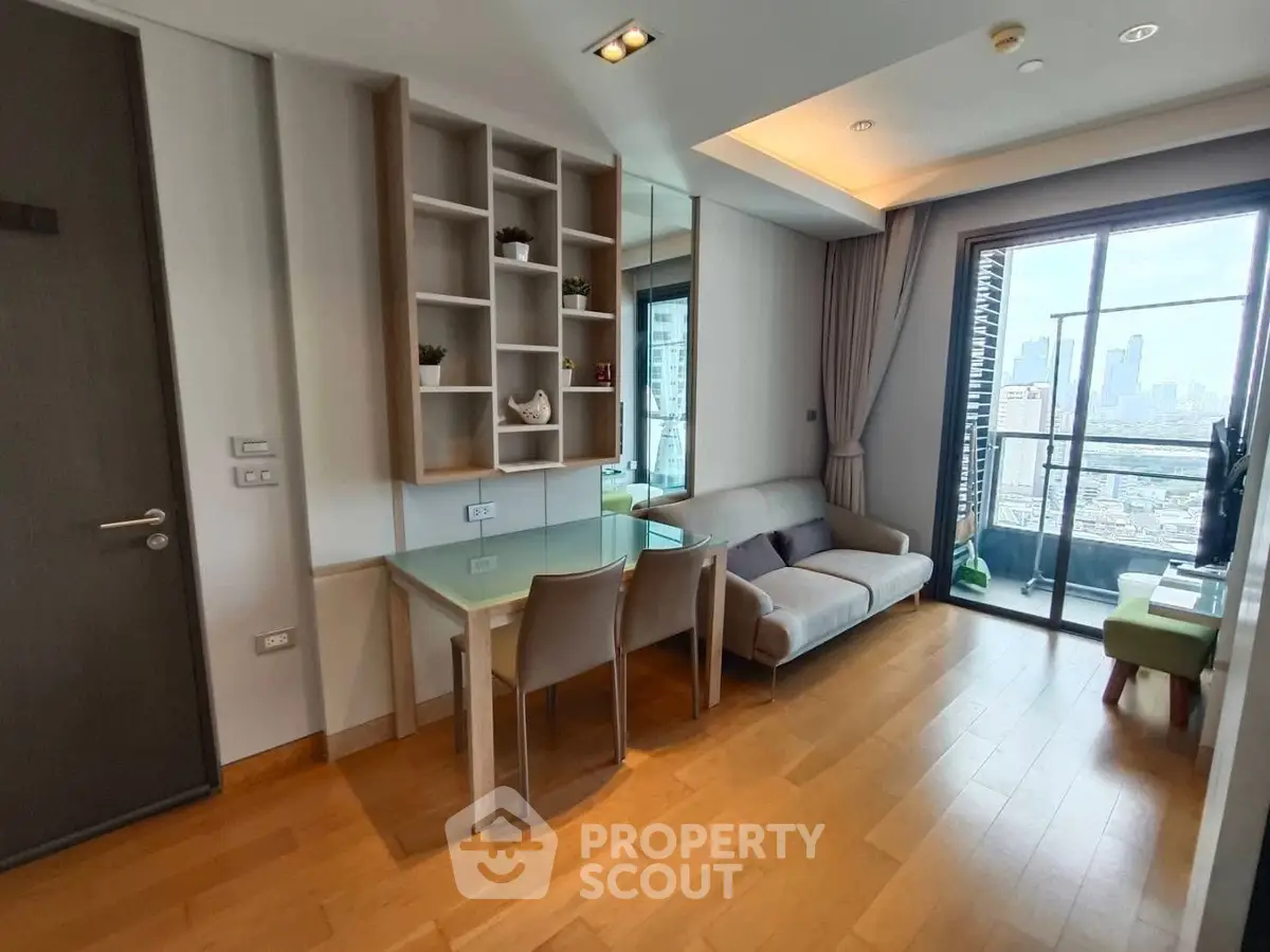 Modern living room with city view and balcony access