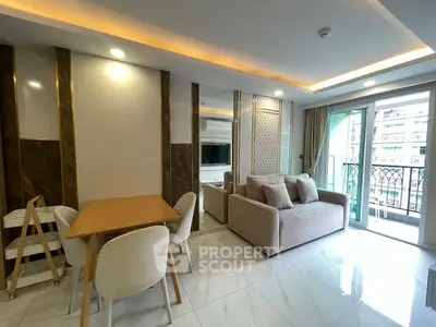 Modern living room with elegant decor and balcony access