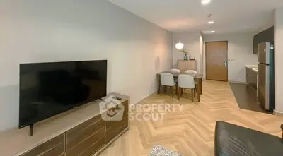 Modern living room with sleek furniture and open layout, perfect for contemporary living.