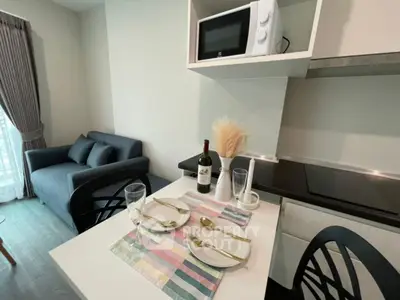 Modern kitchen and dining area with stylish decor and cozy living space