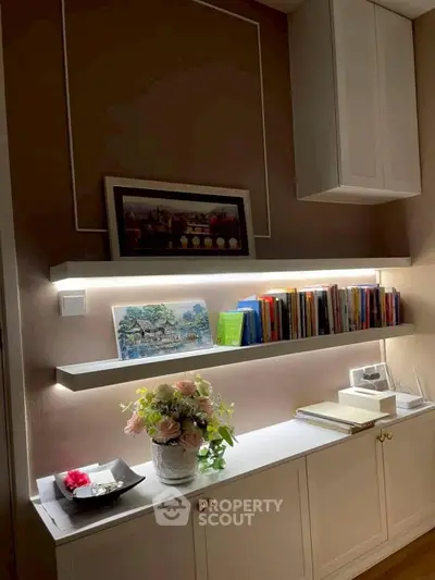 Elegant study nook with floating shelves and ambient lighting
