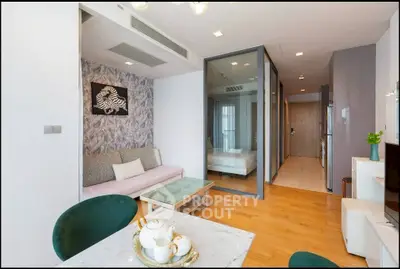 Modern living room with stylish decor and open layout in a contemporary apartment.