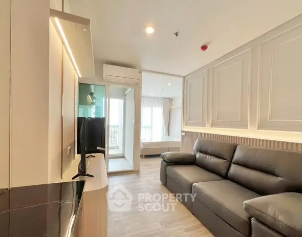 Modern living room with sleek design and natural light