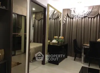 Luxurious apartment interior with elegant dining area and cozy bedroom view.