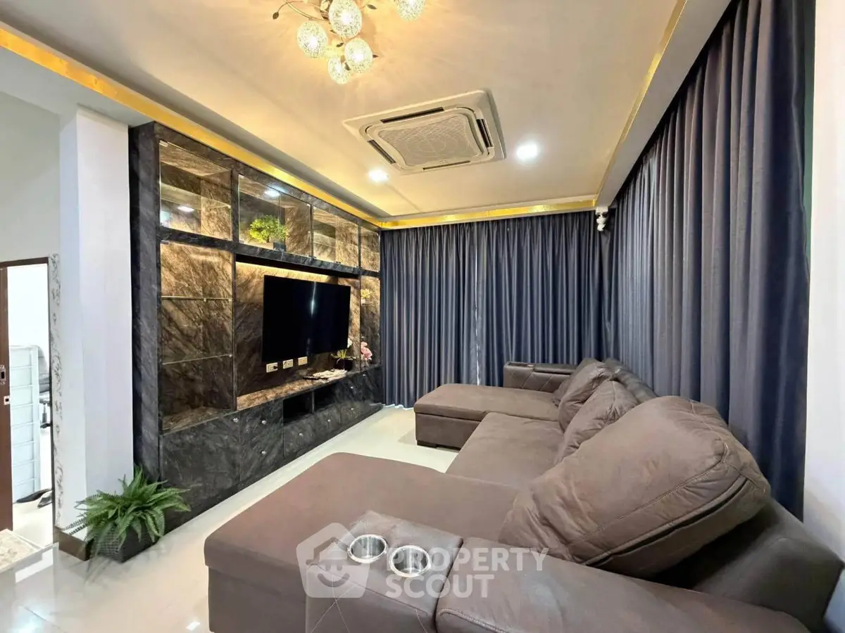 Luxurious living room with plush sectional sofa and elegant lighting