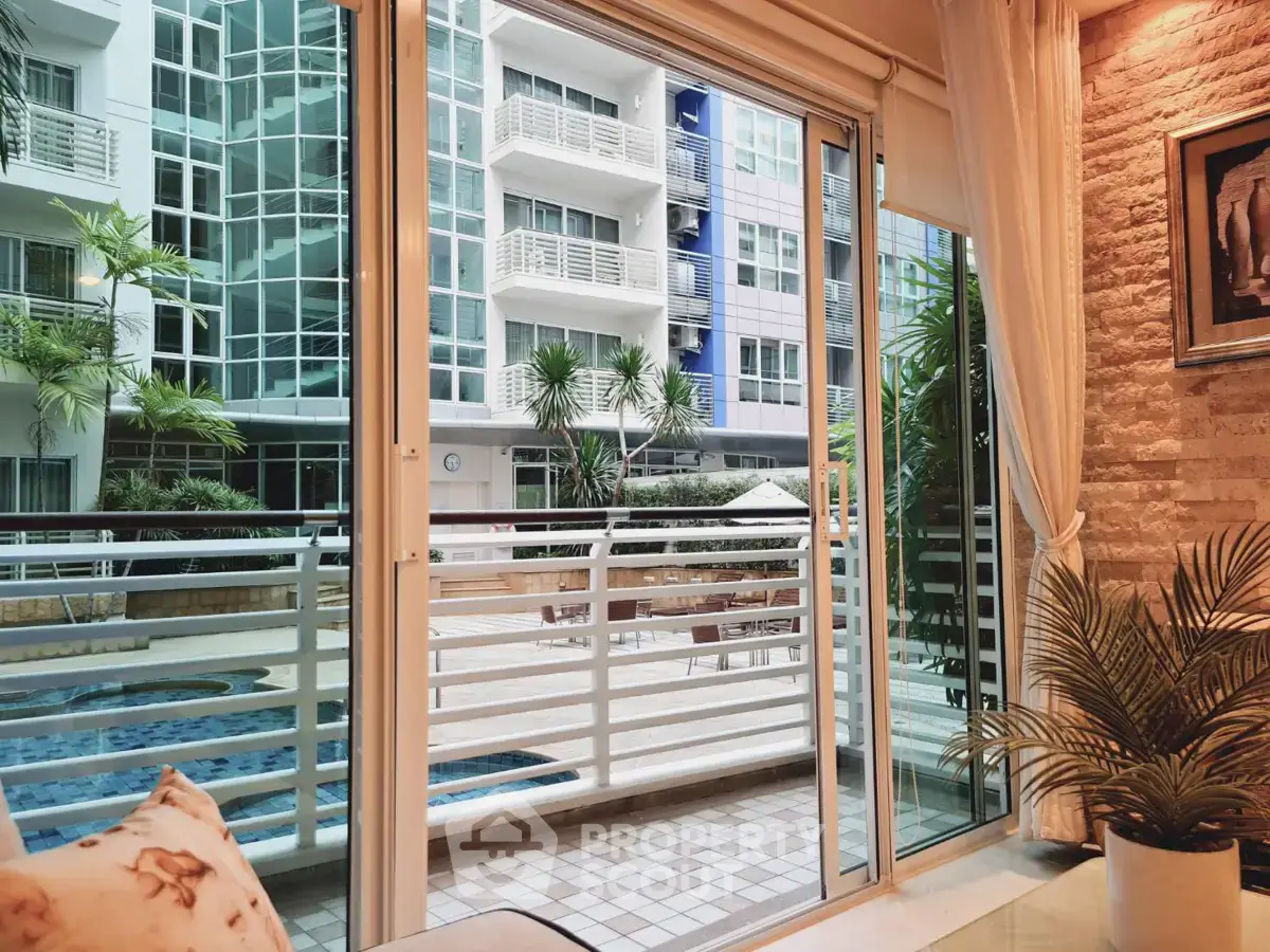 Luxurious apartment with pool view and modern balcony access