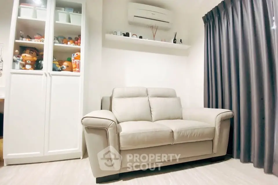 Cozy living room with modern sofa and stylish decor