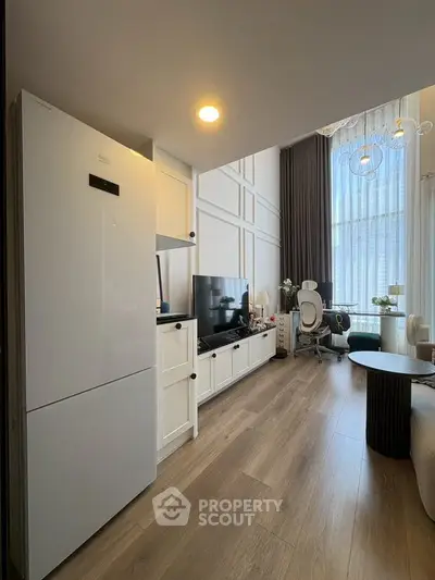 Modern living room with stylish decor and natural light