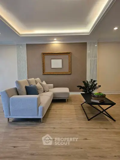 Elegant living room with modern sofa and stylish decor in a luxurious apartment.