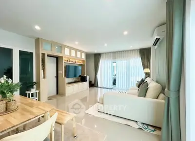 Spacious modern living room with elegant decor and natural light
