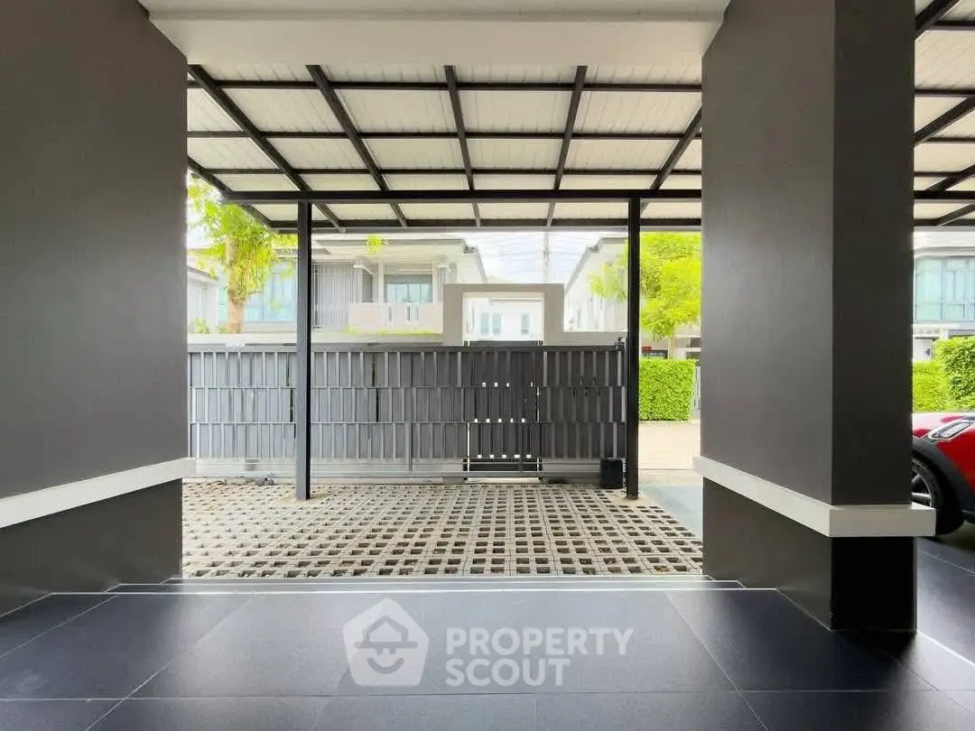 Modern carport with sleek design and ample space in a residential property.