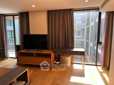 Modern living room with large windows and stylish furniture