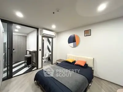 Modern bedroom with ensuite bathroom and stylish decor