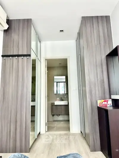 Modern apartment interior with sleek bathroom and wooden accents