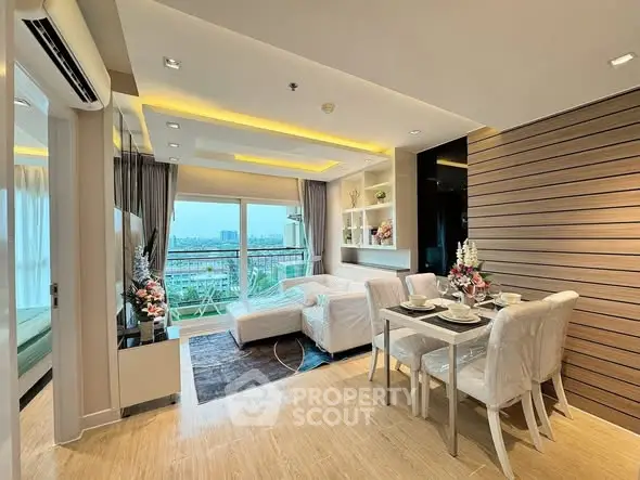 Modern living room with dining area and city view balcony in luxury apartment