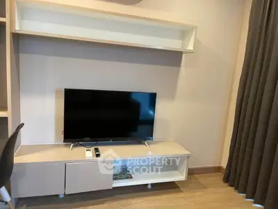Modern living room with sleek TV stand and elegant decor
