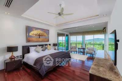 Luxurious bedroom with panoramic view and elegant decor in modern home