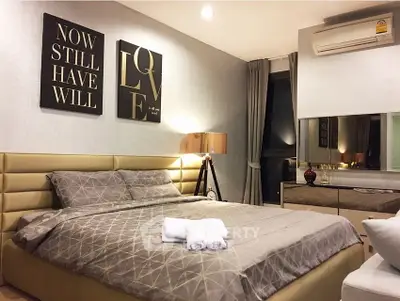 Luxurious bedroom with modern decor and cozy ambiance