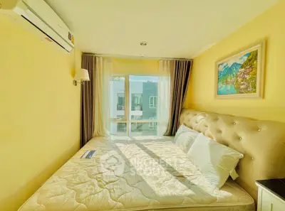 Cozy bedroom with natural light and modern decor in a vibrant apartment.