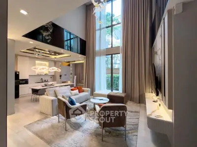 Luxurious modern living room with high ceilings and elegant decor