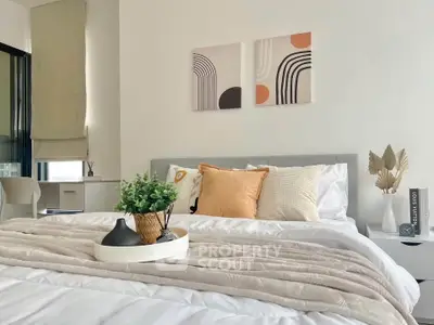 Modern bedroom with stylish decor and cozy bedding