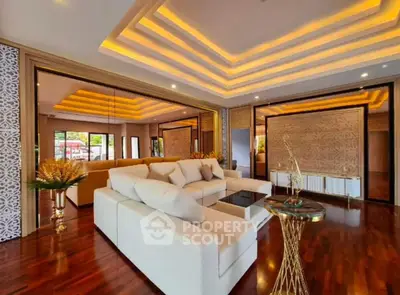 Luxurious modern living room with elegant lighting and stylish decor