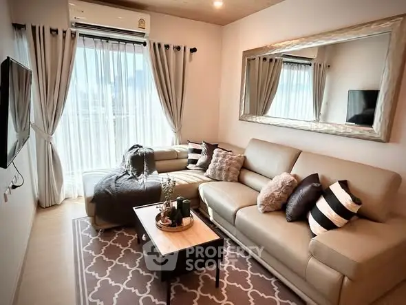 Stylish living room with modern decor and large window view