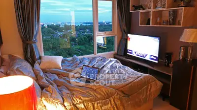 Luxurious bedroom with stunning city view and modern decor