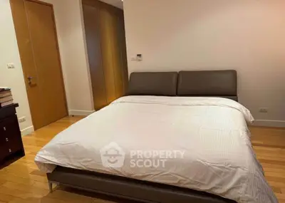 Spacious bedroom with modern design and cozy ambiance