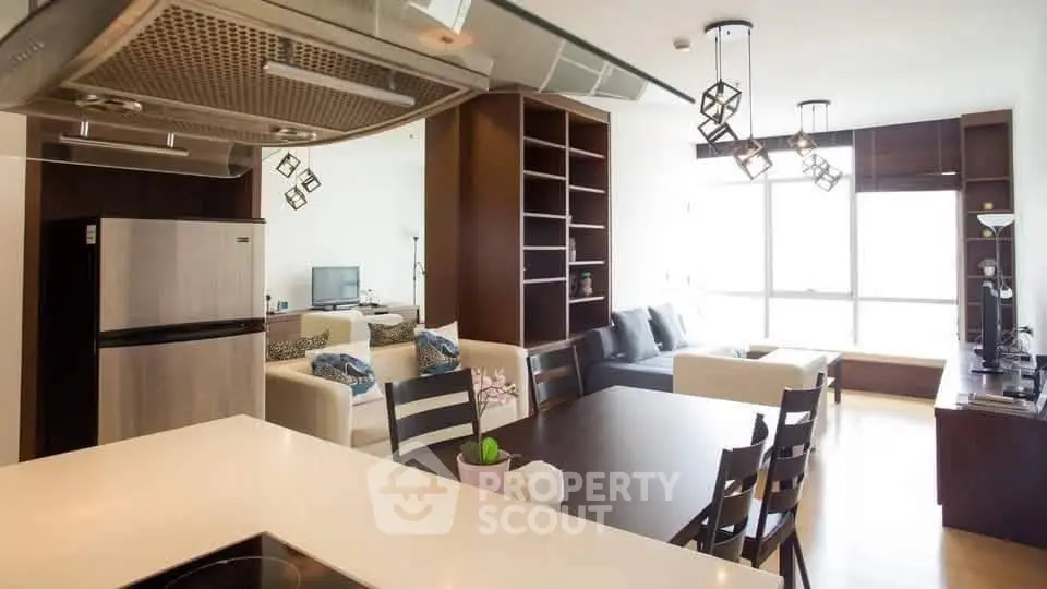Spacious modern living room with open kitchen and stylish decor