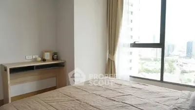 Modern bedroom with large window offering city view and natural light