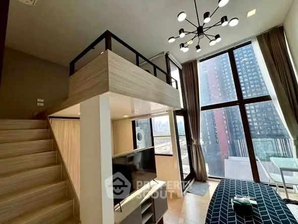 Modern loft apartment with high ceilings and large windows offering stunning city views.