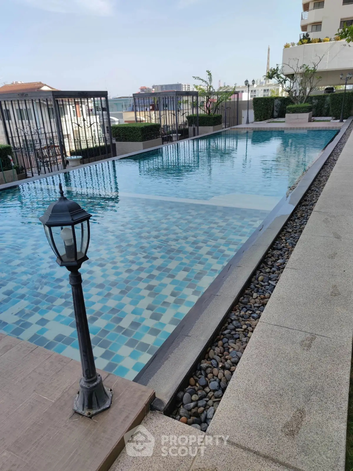 Luxurious outdoor pool area with elegant design and serene ambiance, perfect for relaxation and leisure.