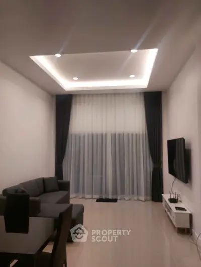 Modern living room with sleek furniture and ambient lighting