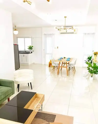 Spacious modern living and dining area with elegant decor and natural light