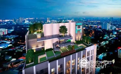 Stunning rooftop view of modern high-rise building with lush greenery and cityscape backdrop.