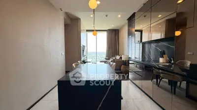Luxurious modern living room with elegant decor and stunning city view, featuring sleek marble flooring and stylish lighting.