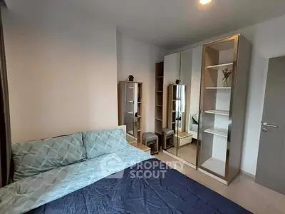 Cozy bedroom with modern wardrobe and stylish decor