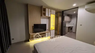 Modern bedroom with open layout and stylish built-in storage