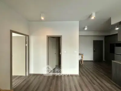 Modern apartment interior with open layout and sleek flooring