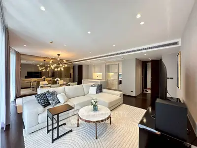 Luxurious modern living room with elegant decor and open kitchen layout