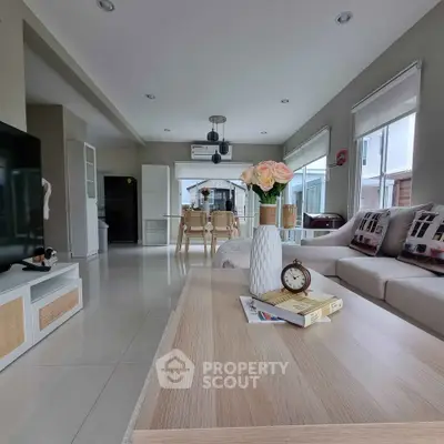 Spacious modern living room with elegant decor and natural light