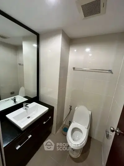 Modern bathroom with sleek fixtures and elegant tile design