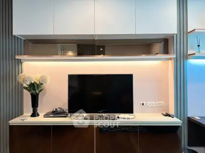 Modern living room with sleek TV setup and elegant decor