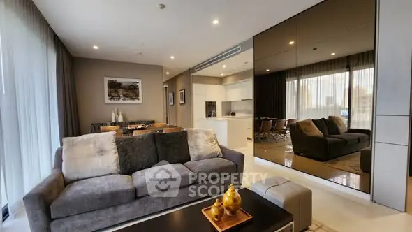 Luxurious modern living room with elegant decor and open kitchen layout