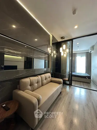 Modern living room with sleek design and cozy sofa in stylish apartment