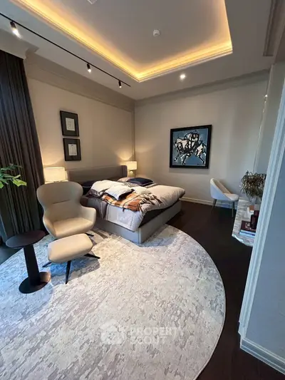 Luxurious modern bedroom with stylish decor and ambient lighting