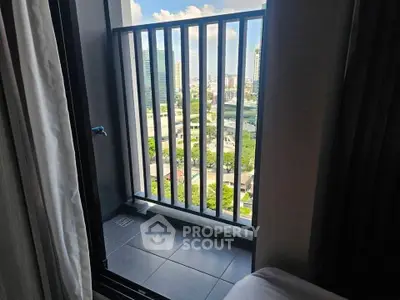 Charming balcony with city view, perfect for relaxation and enjoying urban scenery.