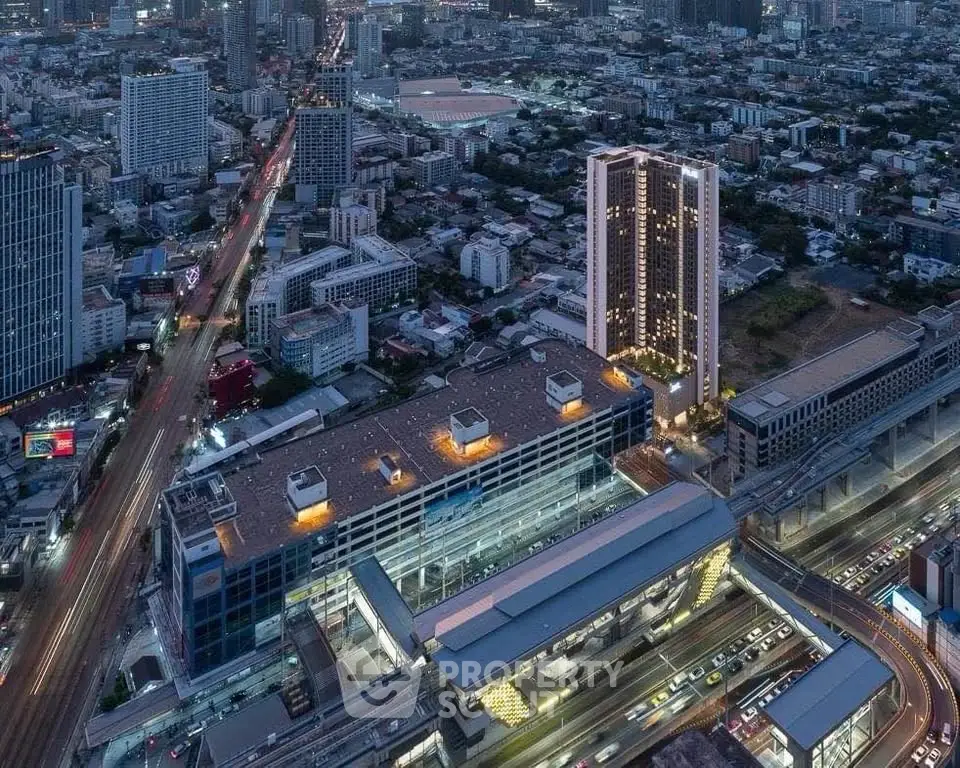 Stunning aerial view of a modern cityscape with high-rise buildings and bustling streets, showcasing urban living.
